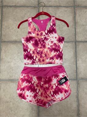 Ideology girls' pink tie-dye longline sports bra and shorts matching set.